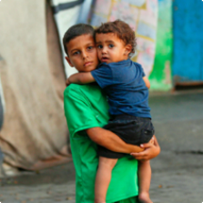 Two siblings at UNRWA shelter